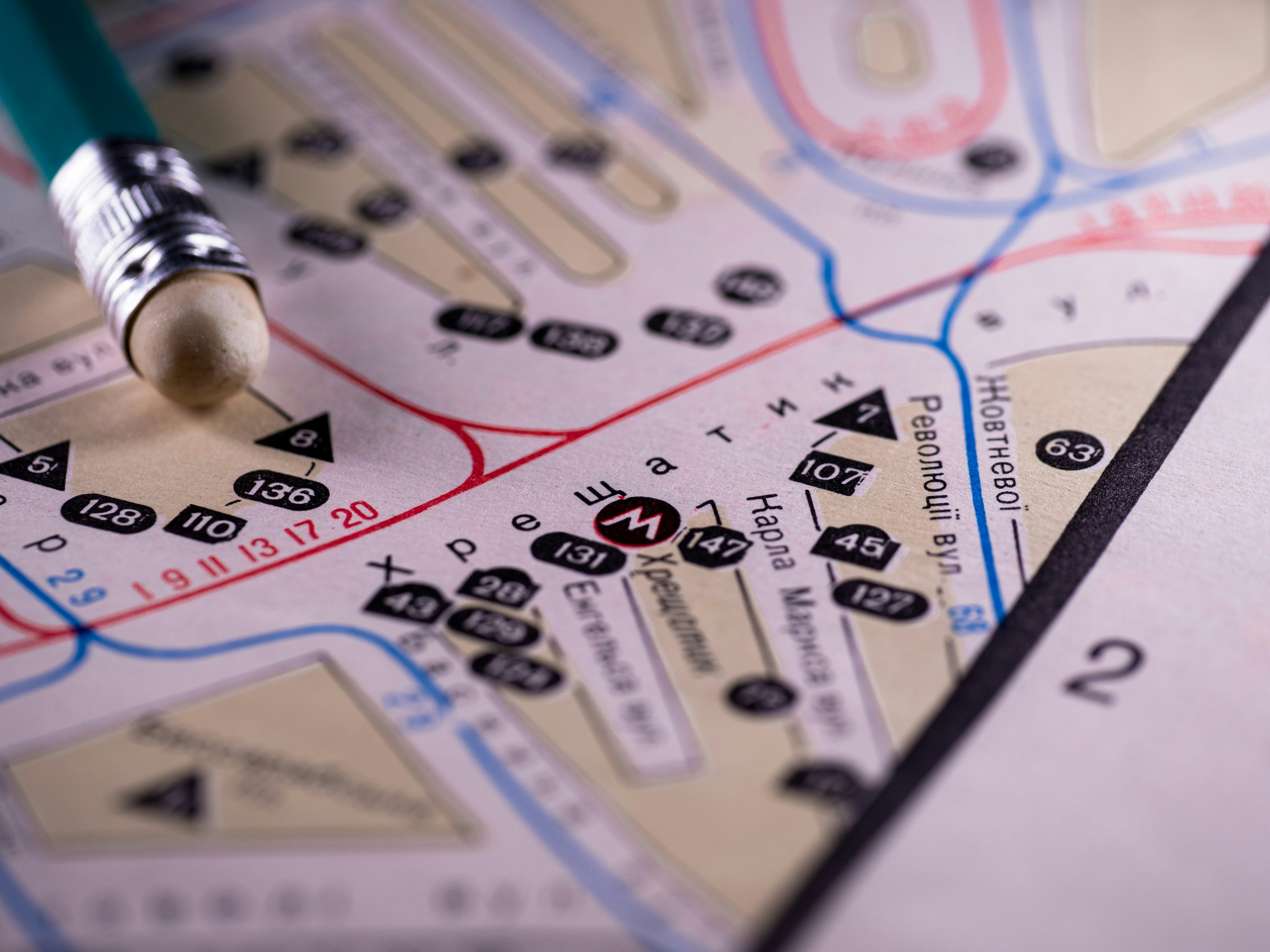 A pencil rests on a map